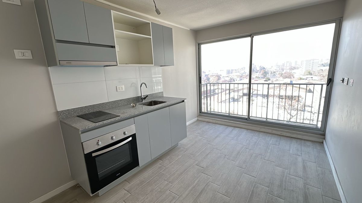 Cocina y living-comedor de un departamento modelo C5 del Edificio Don Tomás